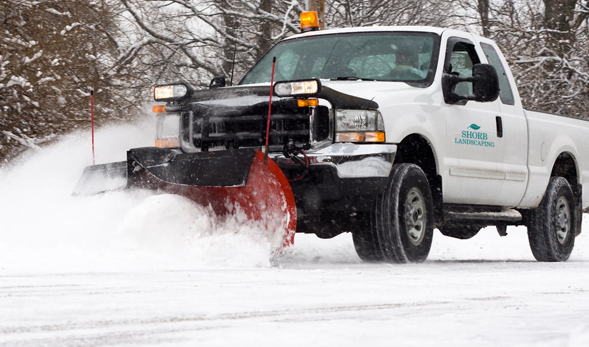 Shorb truck plowing snow
