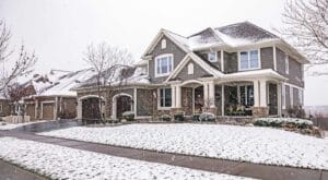Washington DC area home with light snow in yard